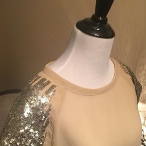 Flirty, sheer top w/ gold sequins